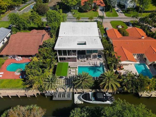 521 Holiday Dr, Hallandale Beach, FL 33009 - bird's eye view of a pool and a nearby body of water