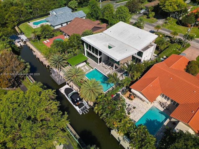 521 Holiday Dr, Hallandale Beach, FL 33009 - drone / aerial view of a pool and a large body of water