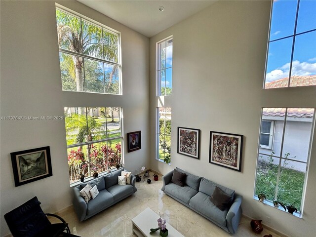 3968 Nighthawk Dr, Weston, FL 33331 - living room with a high ceiling and baseboards