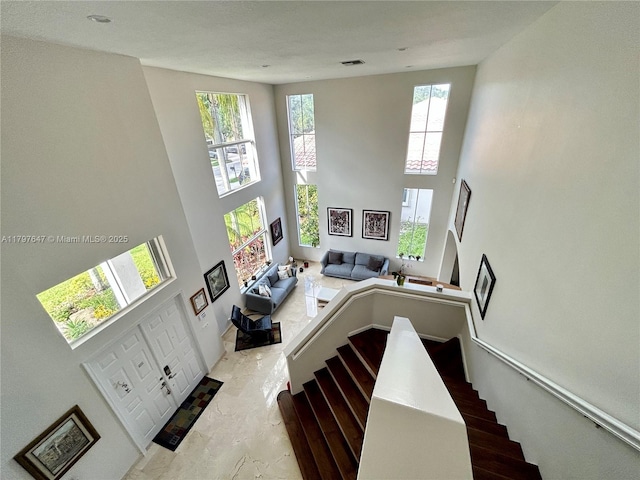 3968 Nighthawk Dr, Weston, FL 33331 - stairs featuring a high ceiling