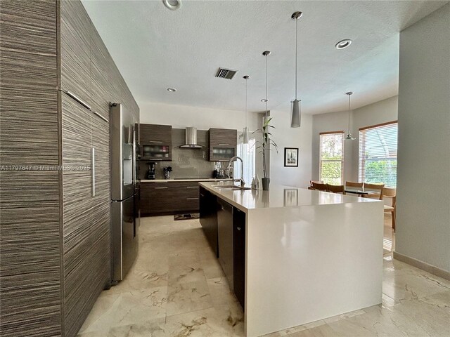 3968 Nighthawk Dr, Weston, FL 33331 - kitchen featuring modern cabinets, wall chimney exhaust hood, stainless steel fridge, dark brown cabinetry, and a sink