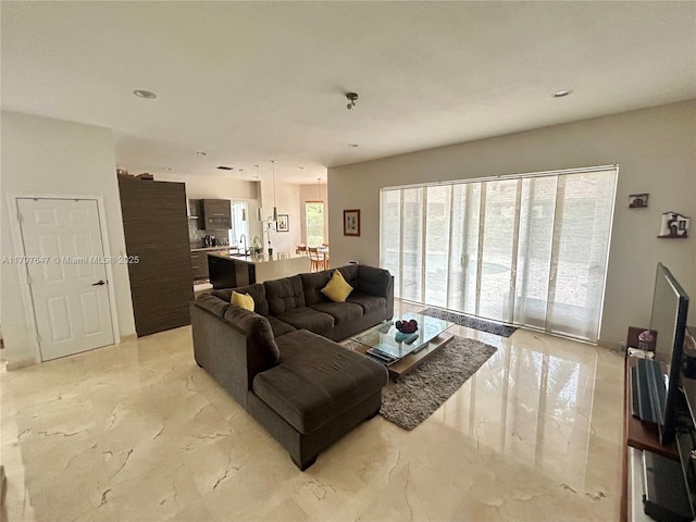 3968 Nighthawk Dr, Weston, FL 33331 - living area featuring light marble finish floors and recessed lighting