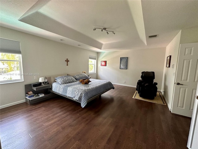 3968 Nighthawk Dr, Weston, FL 33331 - bedroom with a raised ceiling, wood finished floors, and baseboards