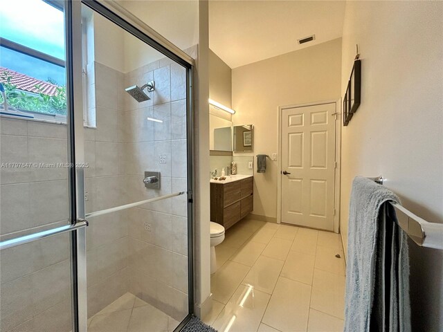 3968 Nighthawk Dr, Weston, FL 33331 - bathroom with vanity, a shower stall, tile patterned flooring, and baseboards