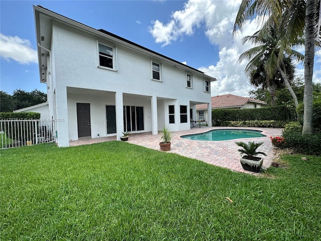 3968 Nighthawk Dr, Weston, FL 33331 - back of house featuring stucco siding and a patio area