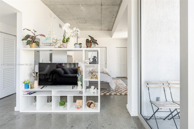 151 SE 1st St Unit 1610, Miami, FL 33131 - living area with finished concrete flooring