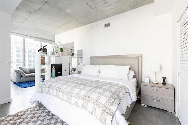 151 SE 1st St Unit 1610, Miami, FL 33131 - bedroom featuring finished concrete floors