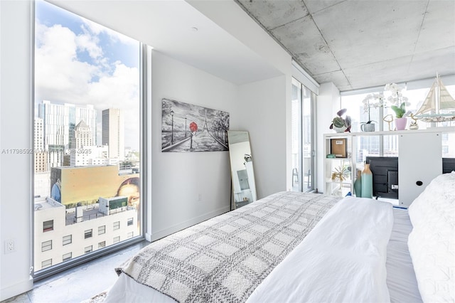 151 SE 1st St Unit 1610, Miami, FL 33131 - bedroom featuring access to outside and baseboards