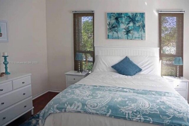 314 SE 4th St, Dania Beach, FL 33004 - bedroom with dark wood finished floors