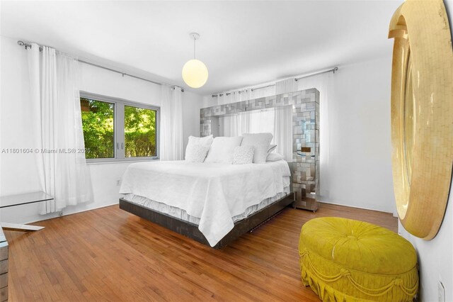 650 NE 60th St, Miami, FL 33137 - bedroom with wood finished floors