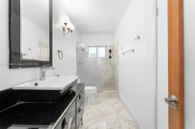 650 NE 60th St, Miami, FL 33137 - bathroom featuring toilet, a stall shower, marble finish flooring, and vanity