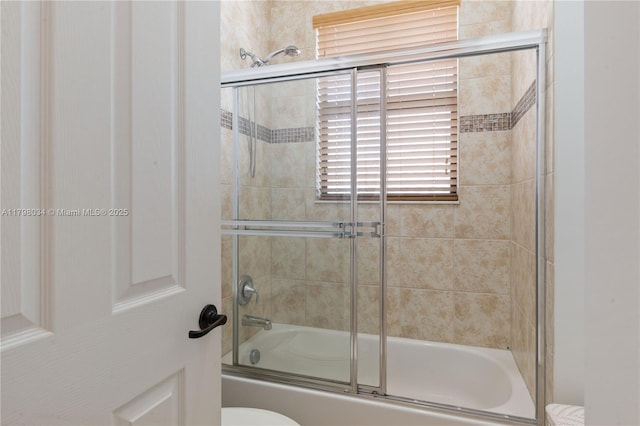 2691 NW 83rd Ter, Cooper City, FL 33024 - full bath with shower / bath combination with glass door and toilet