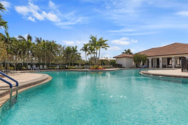 2691 NW 83rd Ter, Cooper City, FL 33024 - community pool featuring a patio area
