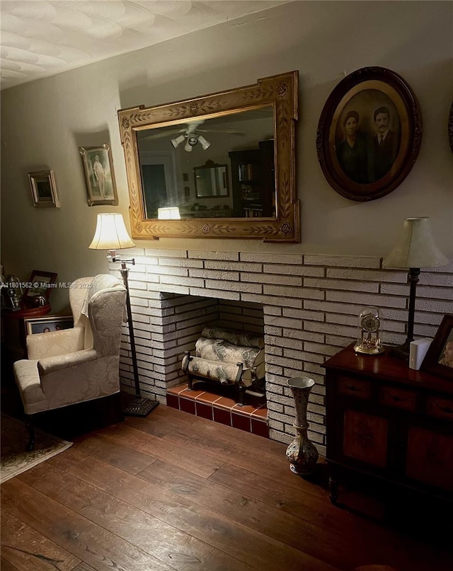 327 SE 2nd Ave, Dania Beach, FL 33004 - sitting room featuring hardwood / wood-style flooring, a fireplace, and ceiling fan
