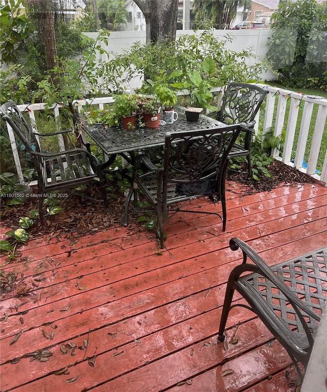327 SE 2nd Ave, Dania Beach, FL 33004 - wooden terrace featuring outdoor dining space