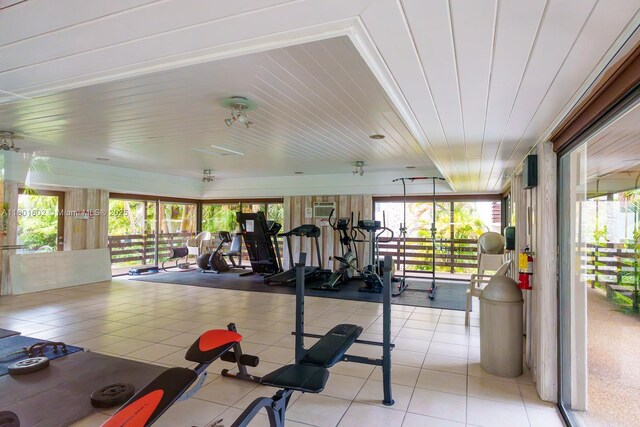 workout area with light tile patterned flooring