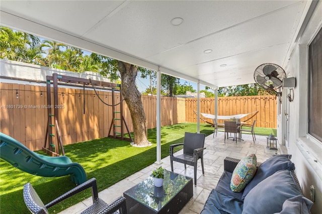 2340 SW 17th Ave, Miami, FL 33145 - view of patio / terrace with an outdoor hangout area, outdoor dining area, and a playground