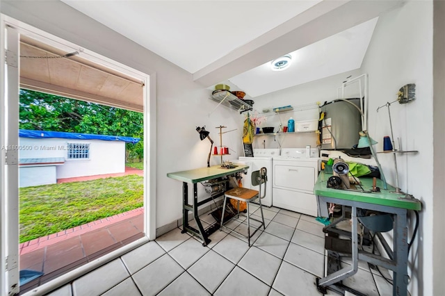 laundry area featuring independent washer and dryer and light tile patterned flooring