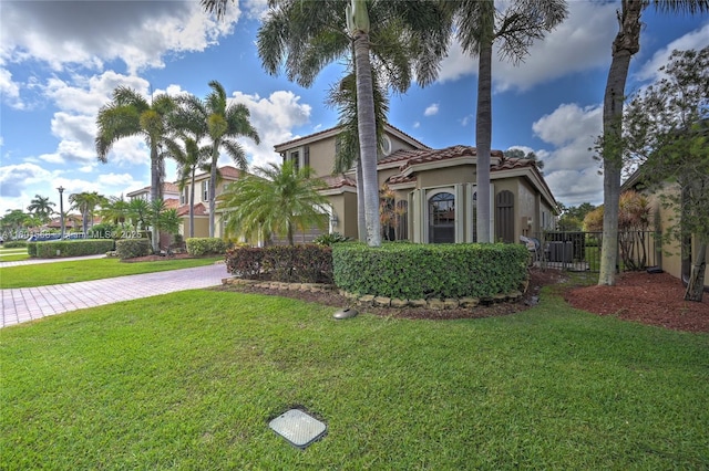 4940 Gateway Gardens Dr, Boynton Beach, FL 33436 - mediterranean / spanish-style home featuring stucco siding and a tiled roof