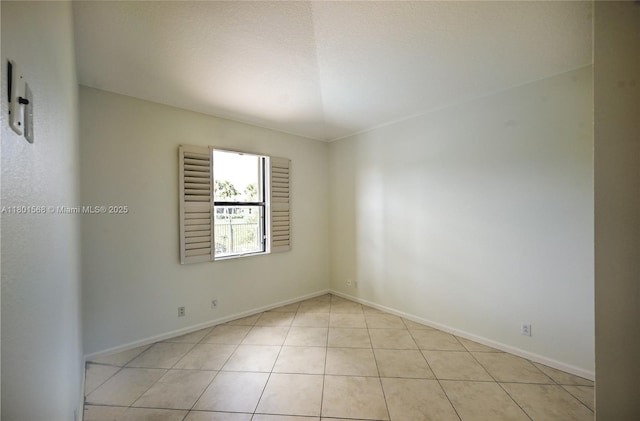 4940 Gateway Gardens Dr, Boynton Beach, FL 33436 - spare room featuring light tile patterned floors and baseboards