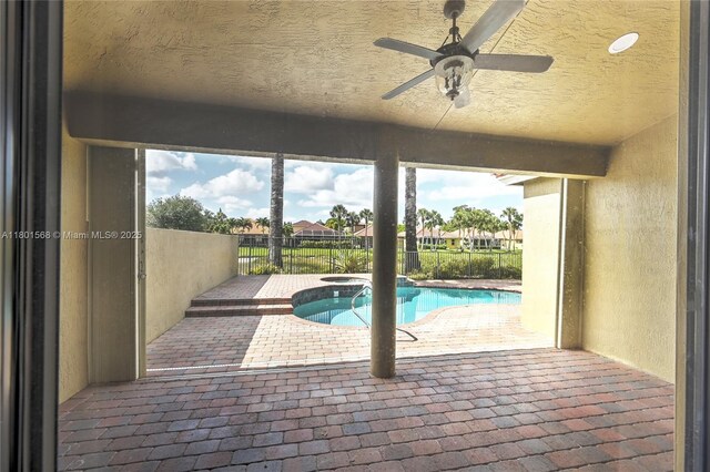 4940 Gateway Gardens Dr, Boynton Beach, FL 33436 - view of swimming pool with a ceiling fan, fence, a patio area, and a pool with connected hot tub