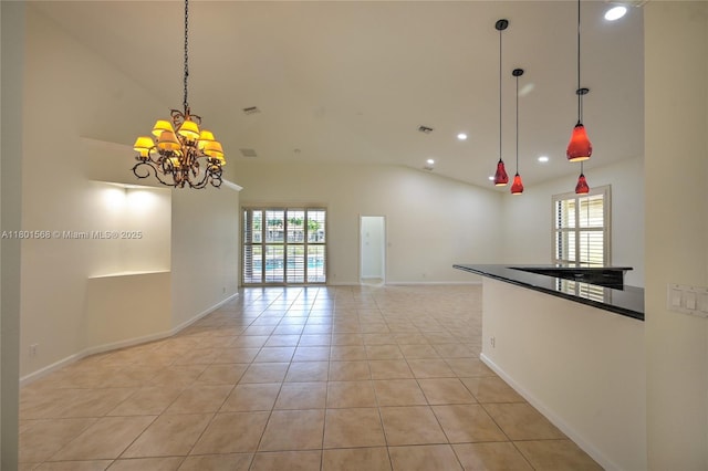 4940 Gateway Gardens Dr, Boynton Beach, FL 33436 - spare room with recessed lighting, light tile patterned floors, a chandelier, high vaulted ceiling, and baseboards