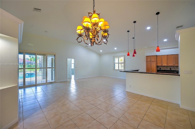 4940 Gateway Gardens Dr, Boynton Beach, FL 33436 - unfurnished living room with a chandelier, light tile patterned flooring, recessed lighting, lofted ceiling, and baseboards