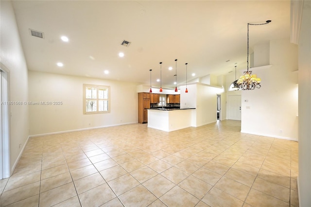 4940 Gateway Gardens Dr, Boynton Beach, FL 33436 - unfurnished living room with light tile patterned floors, recessed lighting, a chandelier, and baseboards
