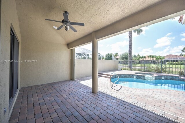 4940 Gateway Gardens Dr, Boynton Beach, FL 33436 - view of pool with a ceiling fan, fence, a patio area, and a pool with connected hot tub