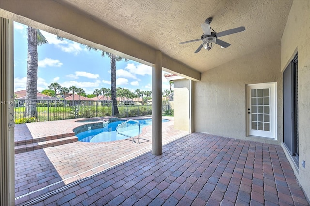 4940 Gateway Gardens Dr, Boynton Beach, FL 33436 - view of pool with a patio area, fence, ceiling fan, and a pool with connected hot tub