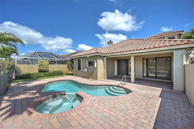 4940 Gateway Gardens Dr, Boynton Beach, FL 33436 - view of swimming pool featuring a patio area and a pool with connected hot tub