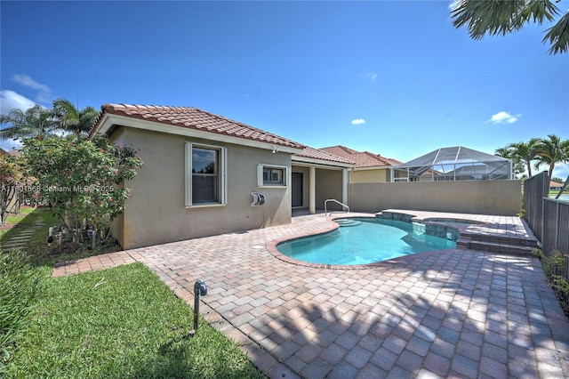 4940 Gateway Gardens Dr, Boynton Beach, FL 33436 - view of swimming pool with a patio area and a fenced backyard