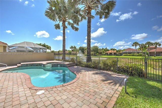 4940 Gateway Gardens Dr, Boynton Beach, FL 33436 - view of pool with a fenced backyard, a patio area, and a pool with connected hot tub