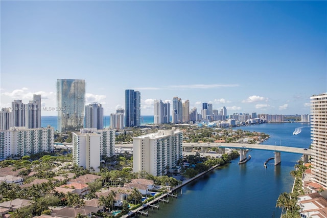 19667 Turnberry Way Unit 27-K, Aventura, FL 33180 - aerial view of a notable bridge, a view of skyline, and a nearby body of water