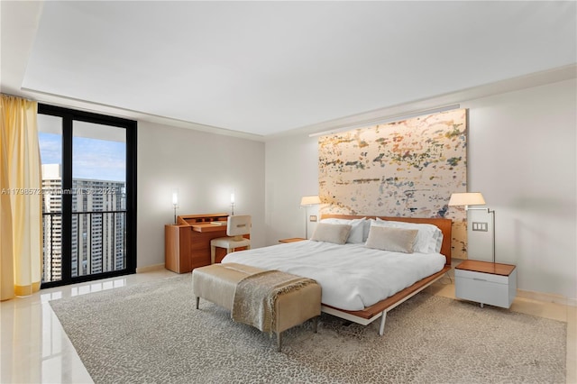 19667 Turnberry Way Unit 27-K, Aventura, FL 33180 - bedroom with access to exterior and baseboards