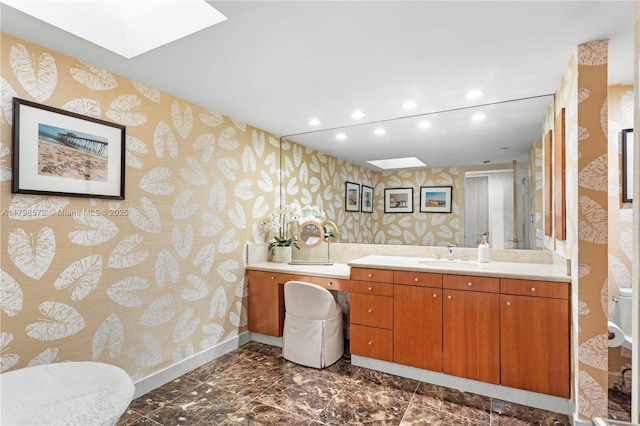 19667 Turnberry Way Unit 27-K, Aventura, FL 33180 - bathroom featuring wallpapered walls, baseboards, recessed lighting, a skylight, and toilet