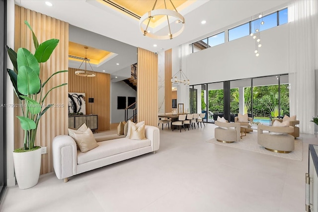 lobby featuring a towering ceiling and recessed lighting