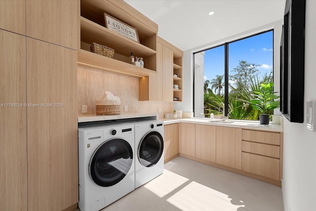 washroom featuring washing machine and dryer