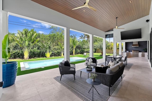 view of patio featuring area for grilling, ceiling fan, an outdoor pool, and outdoor dining area