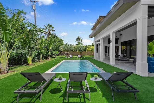 swimming pool featuring a patio area