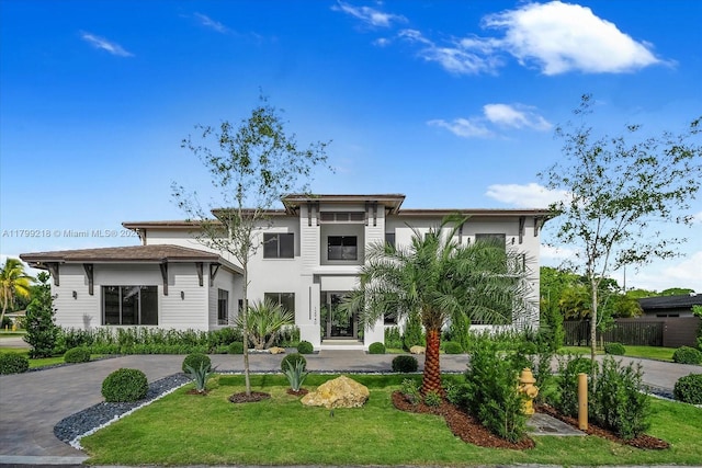 view of front of house featuring stucco siding