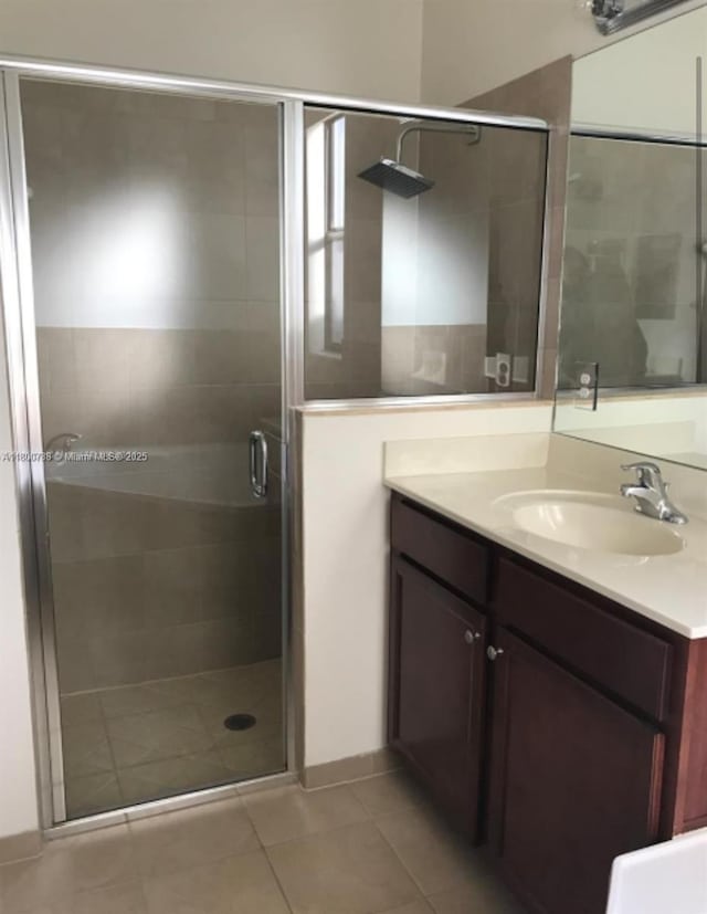 15400 SW 176th Ln, Miami, FL 33187 - full bathroom with tile patterned flooring, a stall shower, and vanity