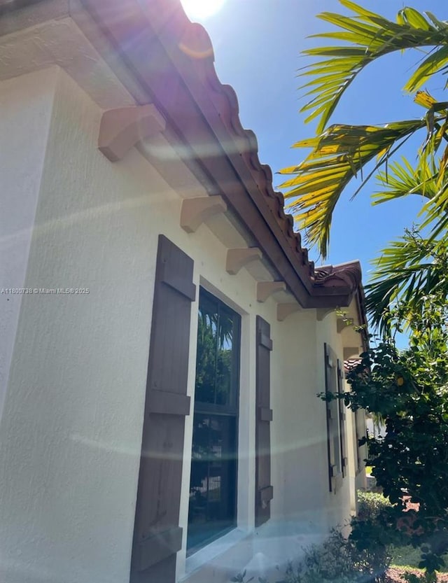15400 SW 176th Ln, Miami, FL 33187 - view of property exterior with stucco siding and a tile roof