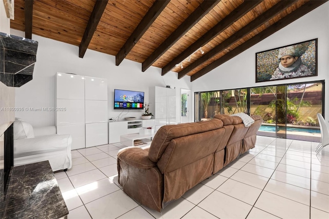 1032 NE 204th Ln Unit B, Miami, FL 33179 - living room featuring wooden ceiling, high vaulted ceiling, light tile patterned flooring, and beamed ceiling