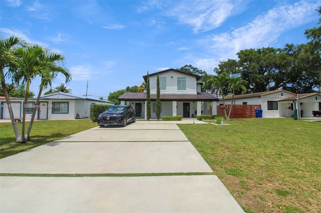 1187 NE 182nd St, North Miami Beach, FL 33162 - view of front facade with concrete driveway and stucco siding