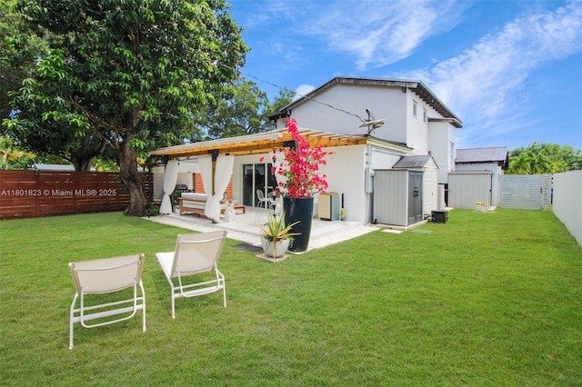 1187 NE 182nd St, North Miami Beach, FL 33162 - back of house featuring a patio, a shed, an outbuilding, and stucco siding