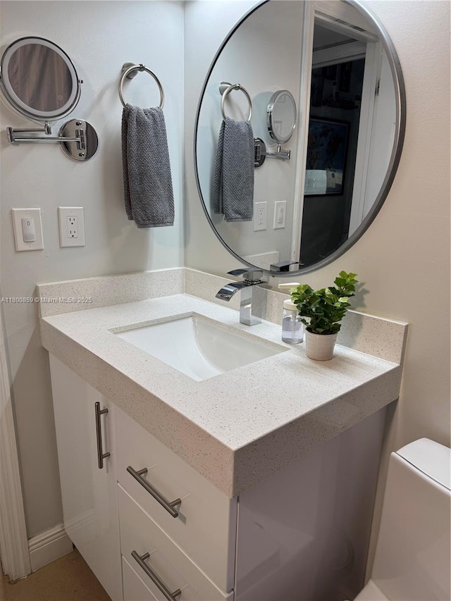 half bath featuring vanity