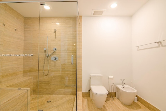 15811 Collins Ave Unit 2602, Sunny Isles Beach, FL 33160 - full bathroom featuring a shower stall, a bidet, and toilet
