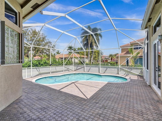4985 NW 120th Ave, Coral Springs, FL 33076 - swimming pool with a patio and glass enclosure