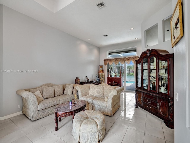 4985 NW 120th Ave, Coral Springs, FL 33076 - living area featuring light tile patterned floors and recessed lighting